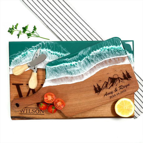 a cutting board with a knife, lemon and tomatoes on it
