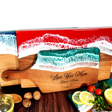 a wooden box with a painting of a boat on it