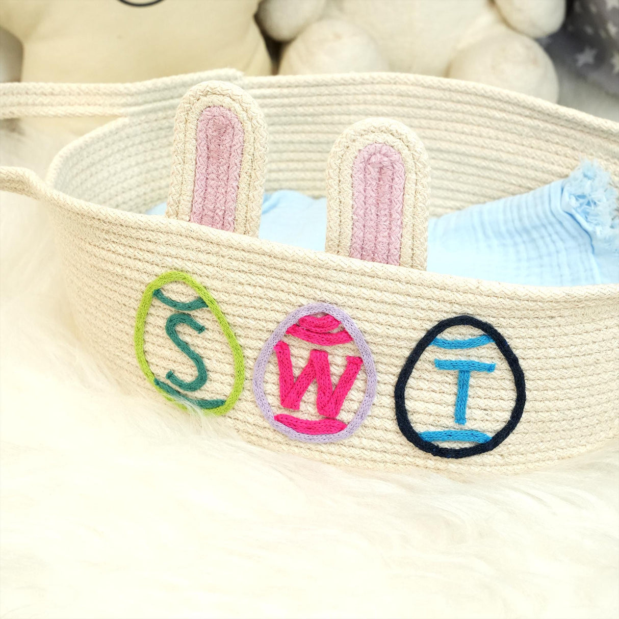 a basket that has some bunny ears in it