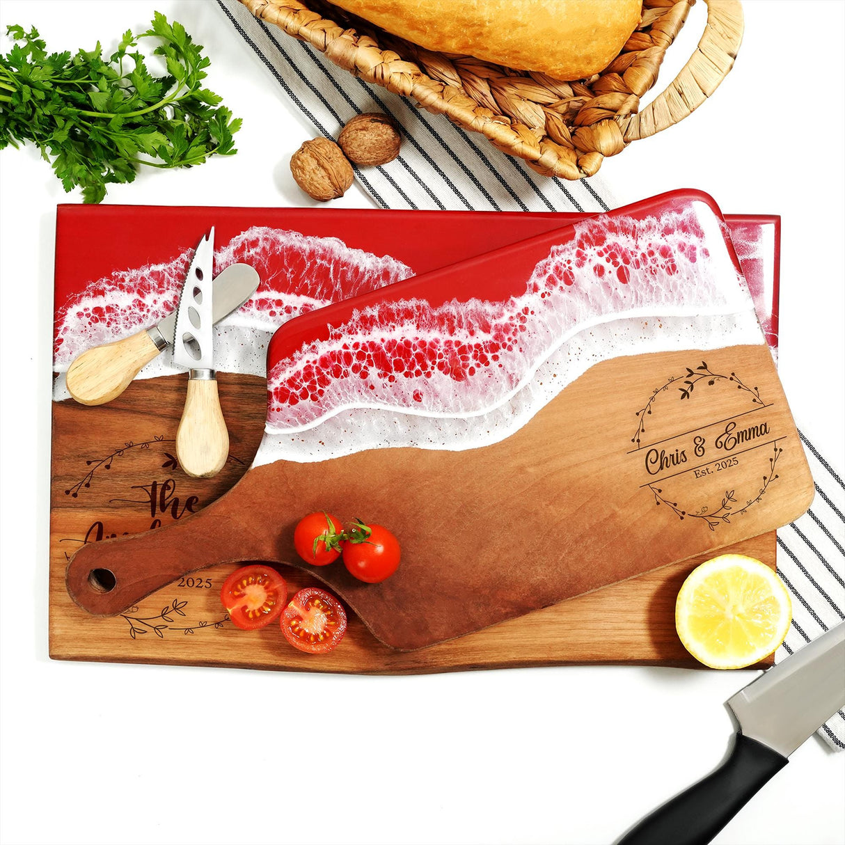 a cutting board with a knife and tomatoes on it