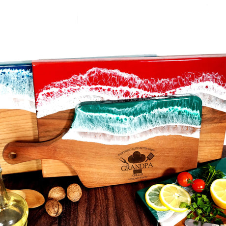 a wooden box with a painting of a boat on it
