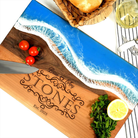 a cutting board with a knife and tomatoes on it
