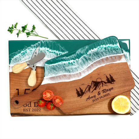 a cutting board with a knife, lemon and tomatoes on it