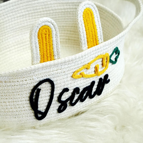 a close up of a basket on a furry surface