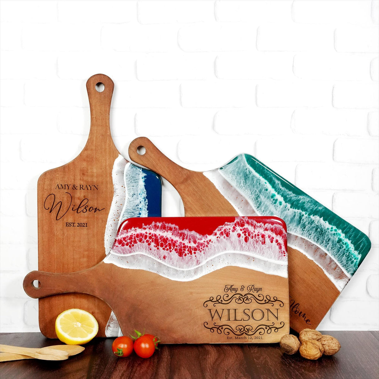 a couple of cutting boards sitting on top of a table