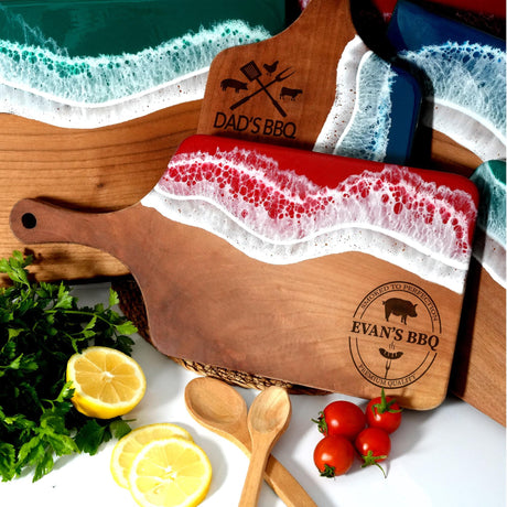 a cutting board with a knife, lemons, tomatoes and parsley