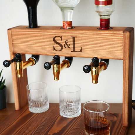 a wooden shelf holding three glasses and a shot glass