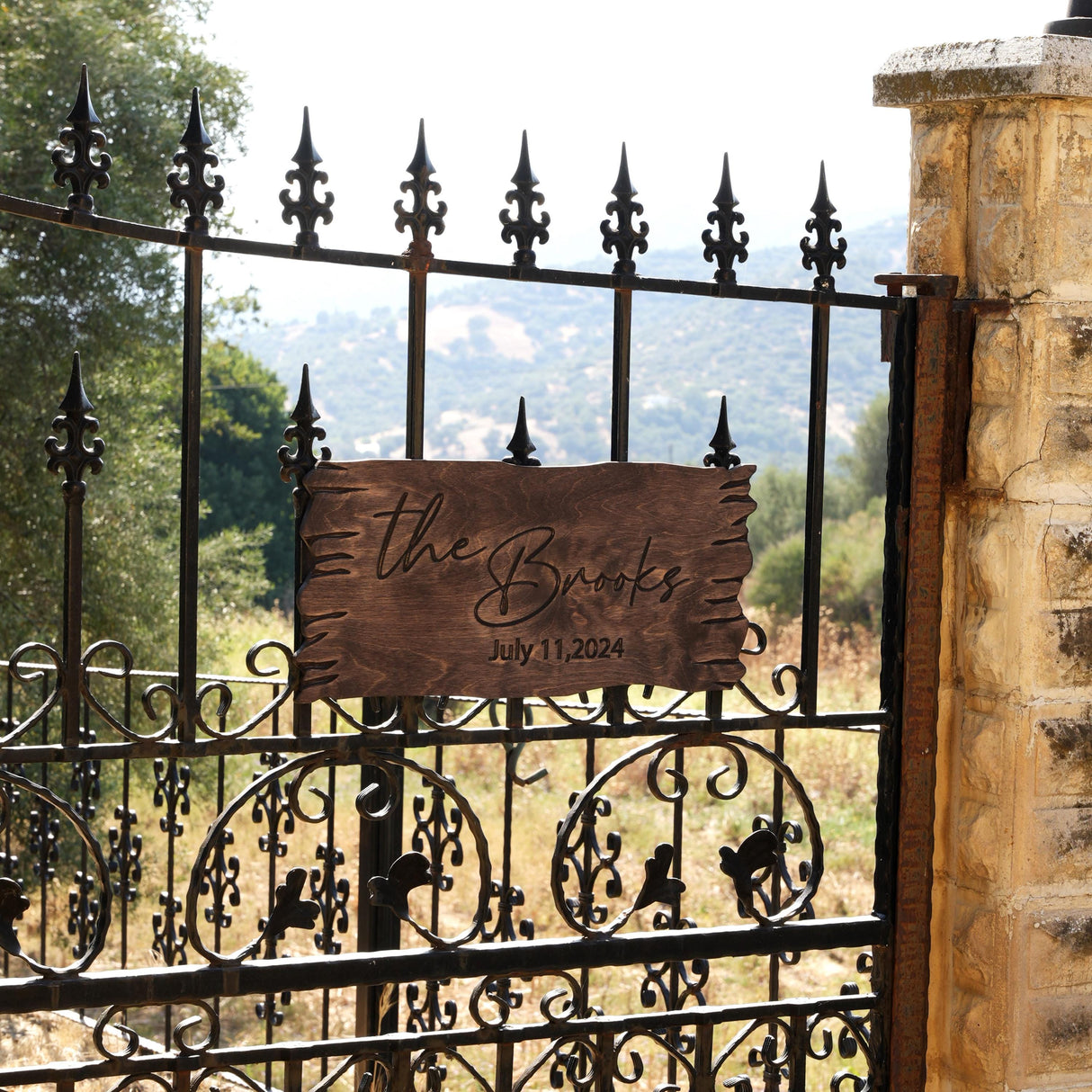 a gate with a sign on it that says the boss