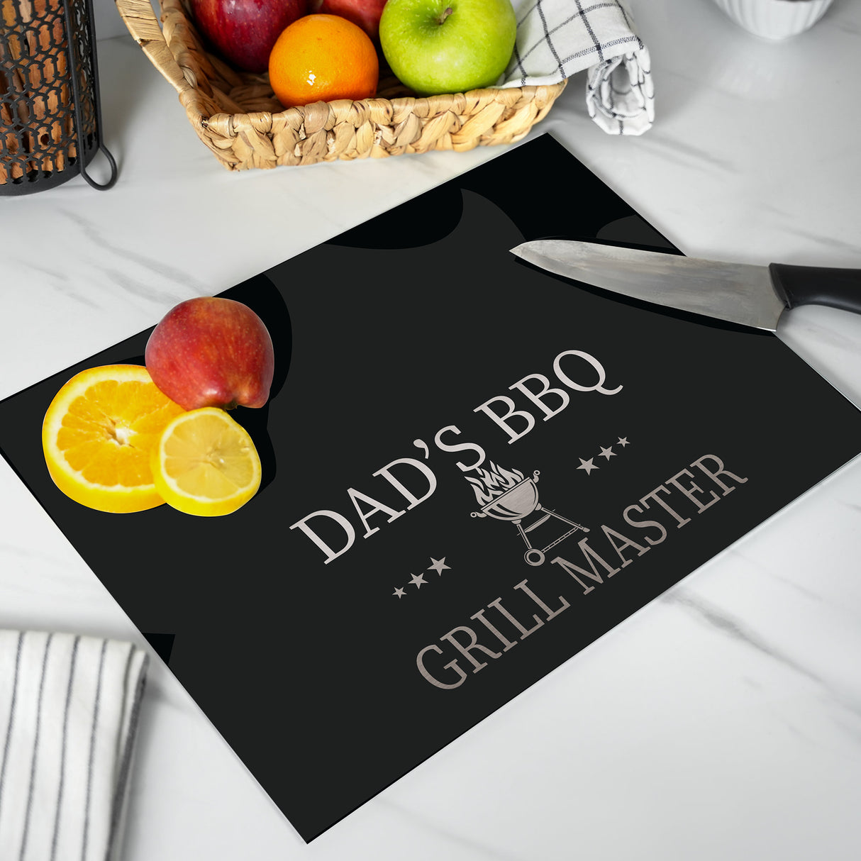 a dad's bbq grillmaster mat with apples, oranges, and