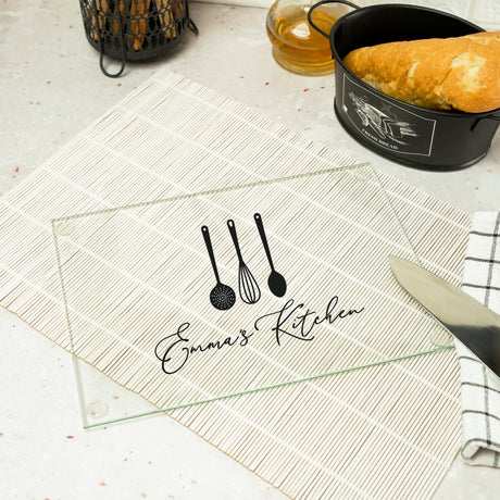 a table topped with a knife and a loaf of bread
