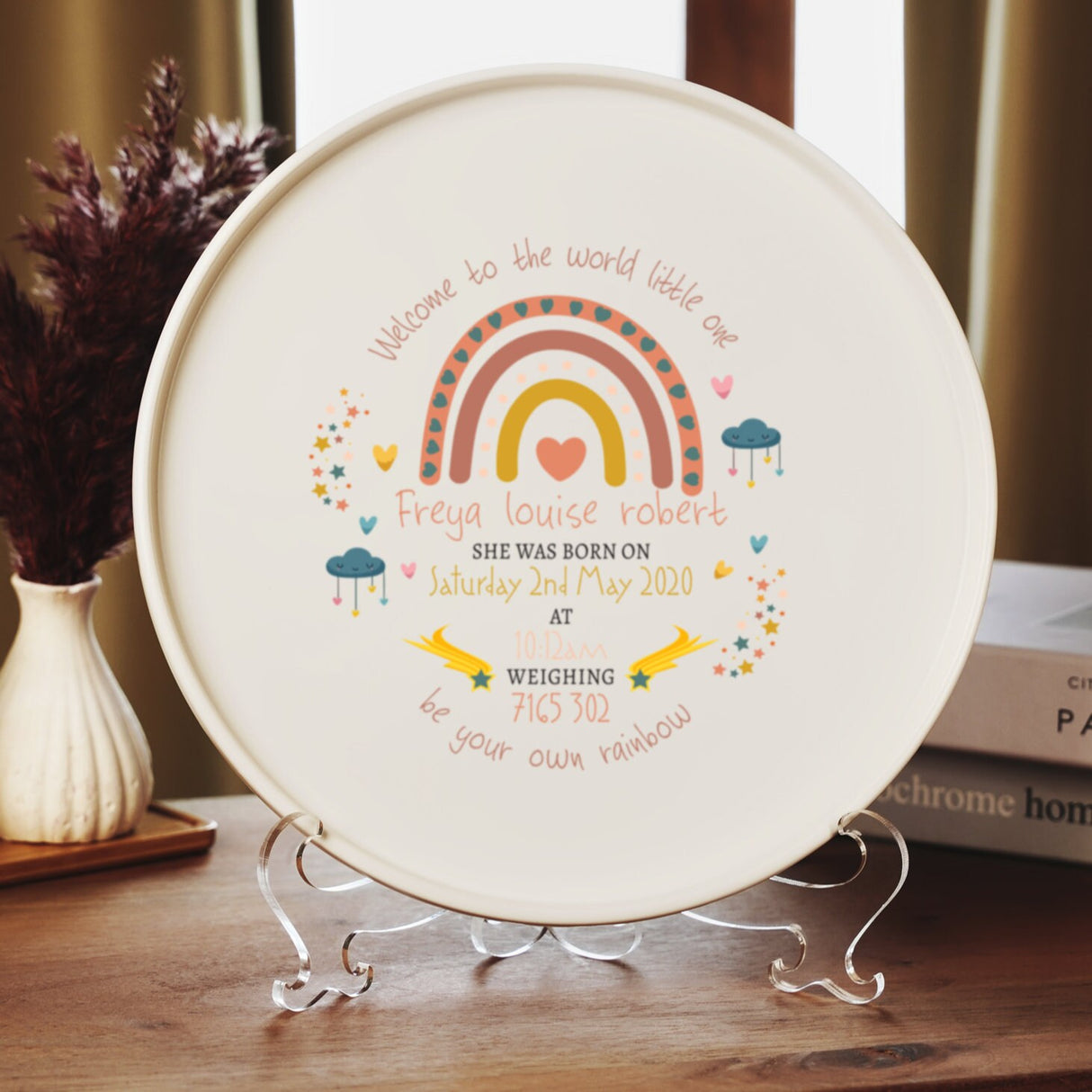 a plate with a picture of a rainbow on it