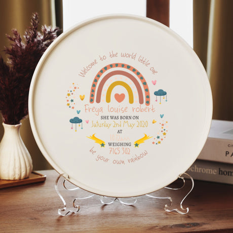 a plate with a picture of a rainbow on it