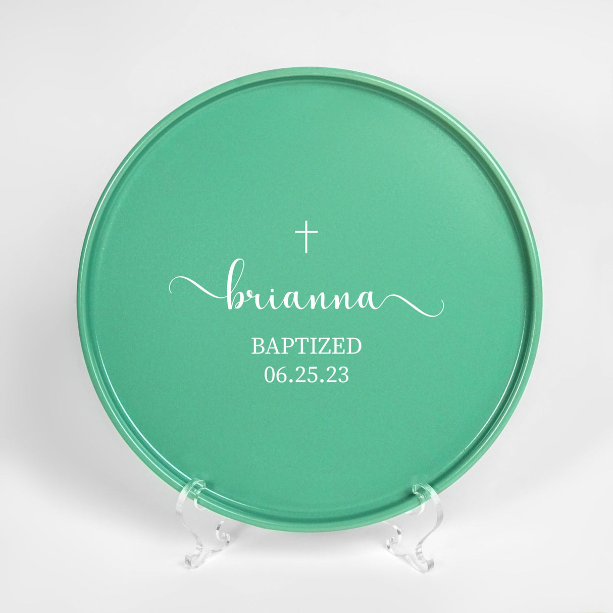 a green plate with a cross on it