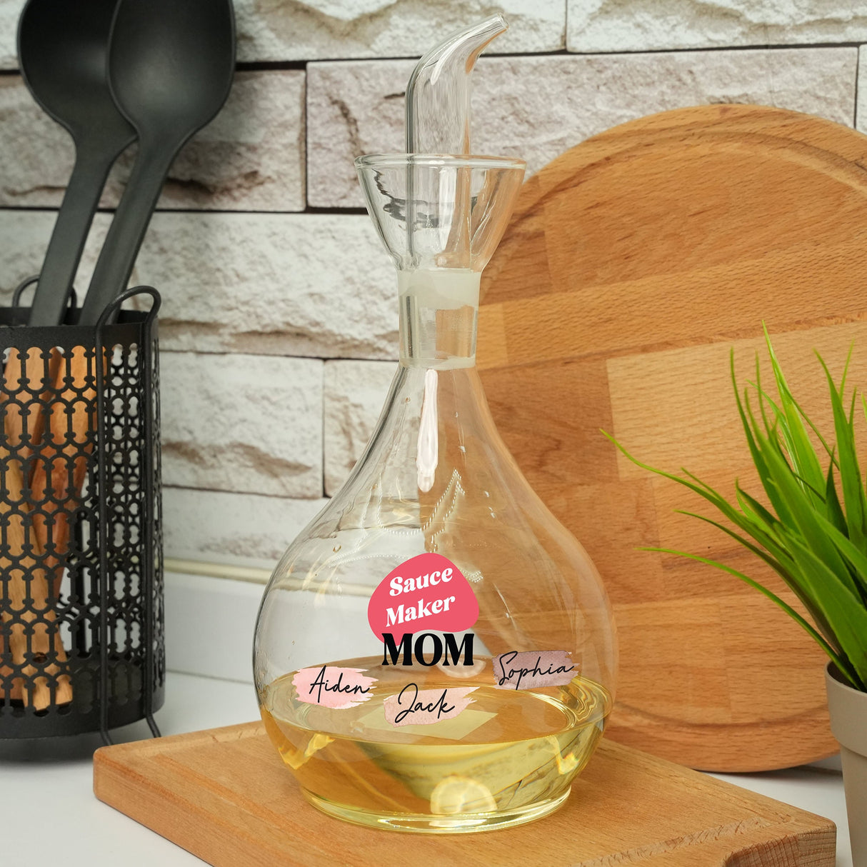 a decanter with a mom's message is sitting on a cutting board