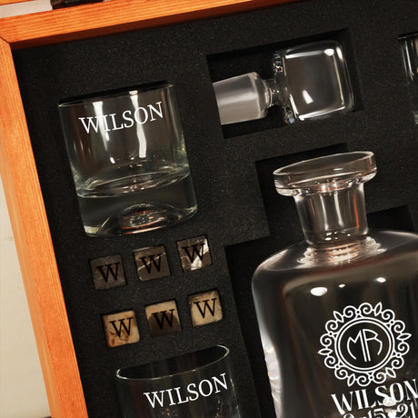a bottle of wilson whiskey in a wooden case