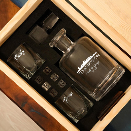 a wooden box with three glasses in it