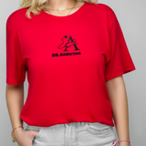 a woman with blonde hair, wearing a red doctor T-shirt