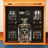a set of glasses and a decanter in a wooden box