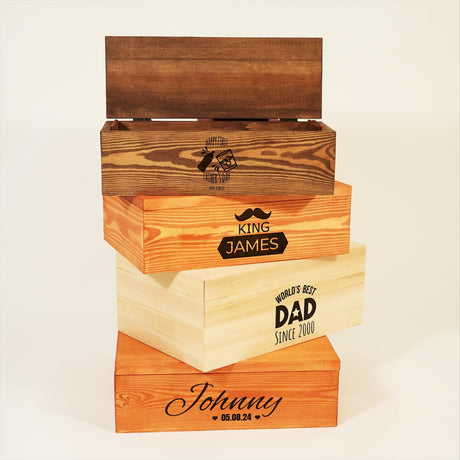 a stack of three wooden boxes sitting on top of each other