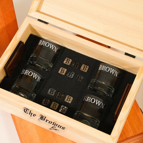 a wooden box with six shot glasses in it