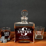 a bottle of smoth&#39;s whiskey next to two shot glasses