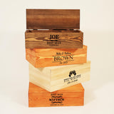 a stack of four wooden boxes sitting on top of each other
