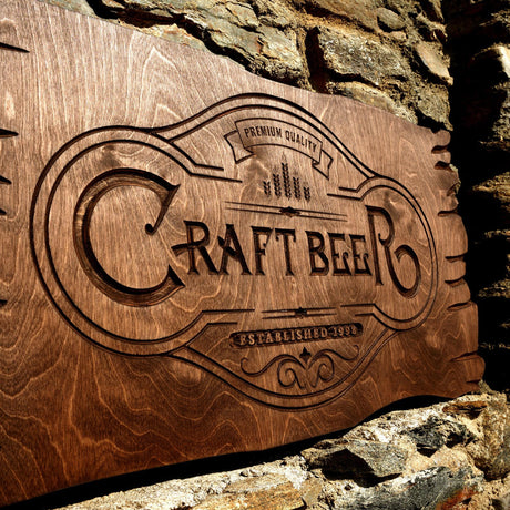 a wooden sign on the side of a stone wall