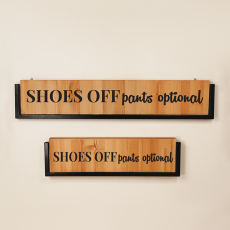 two shoe racks of different sizes mounted on the wall