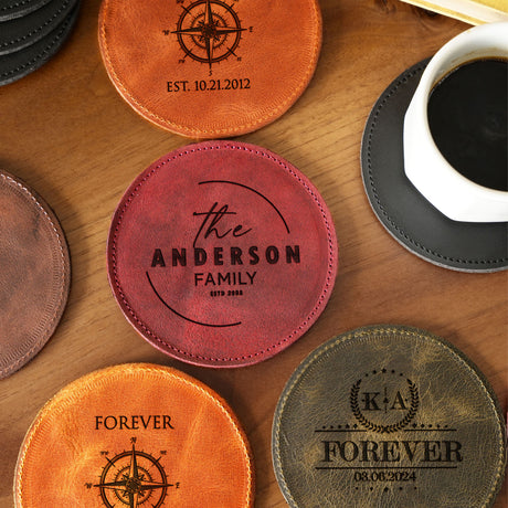 four coasters with the names of four different family members