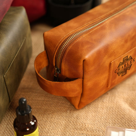 a brown leather bag sitting on top of a table