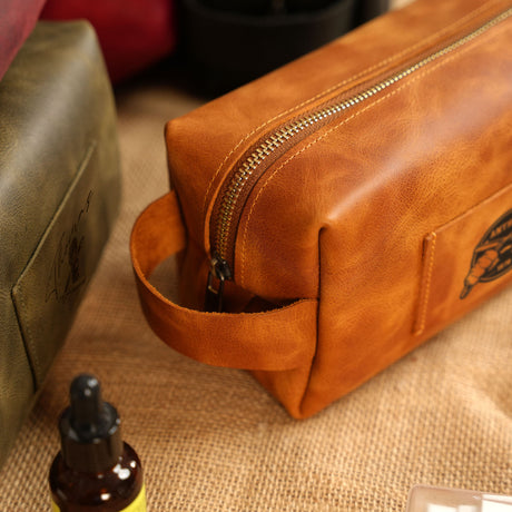 a brown leather bag sitting on top of a table