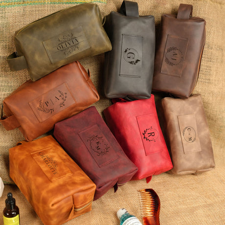 a group of leather bags sitting on top of a table