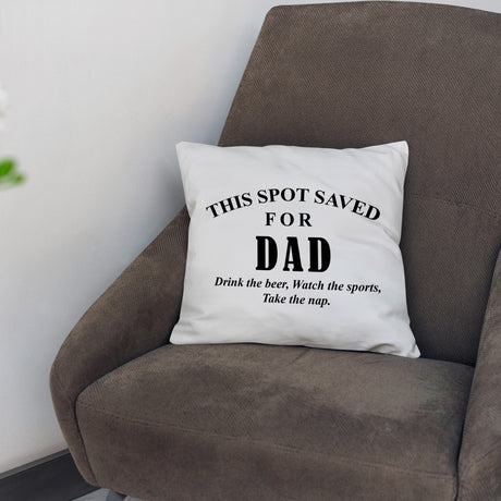 a pillow that says, this spot saved for dad