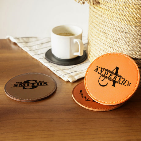 a couple of coasters sitting on top of a wooden table