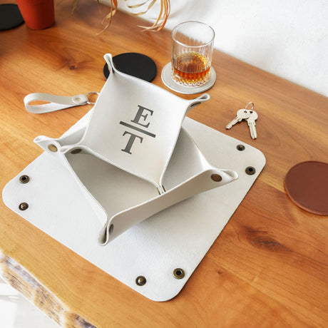 a wooden table topped with a tray of food