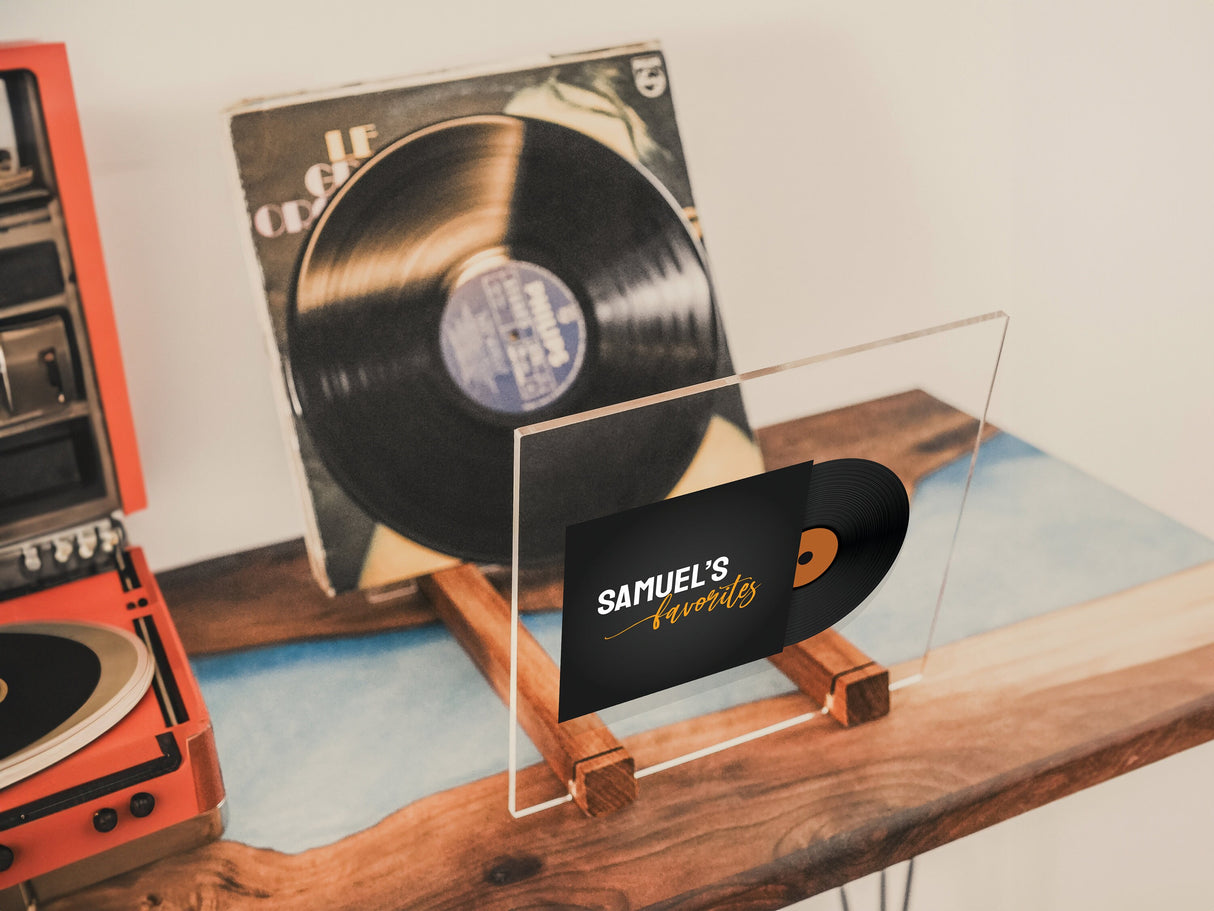 a record player sitting on top of a wooden table