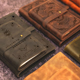 a bunch of different types of leather cases