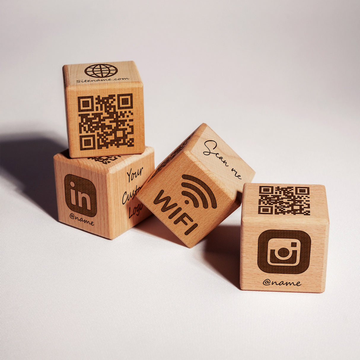 a group of wooden blocks with a qr code on them