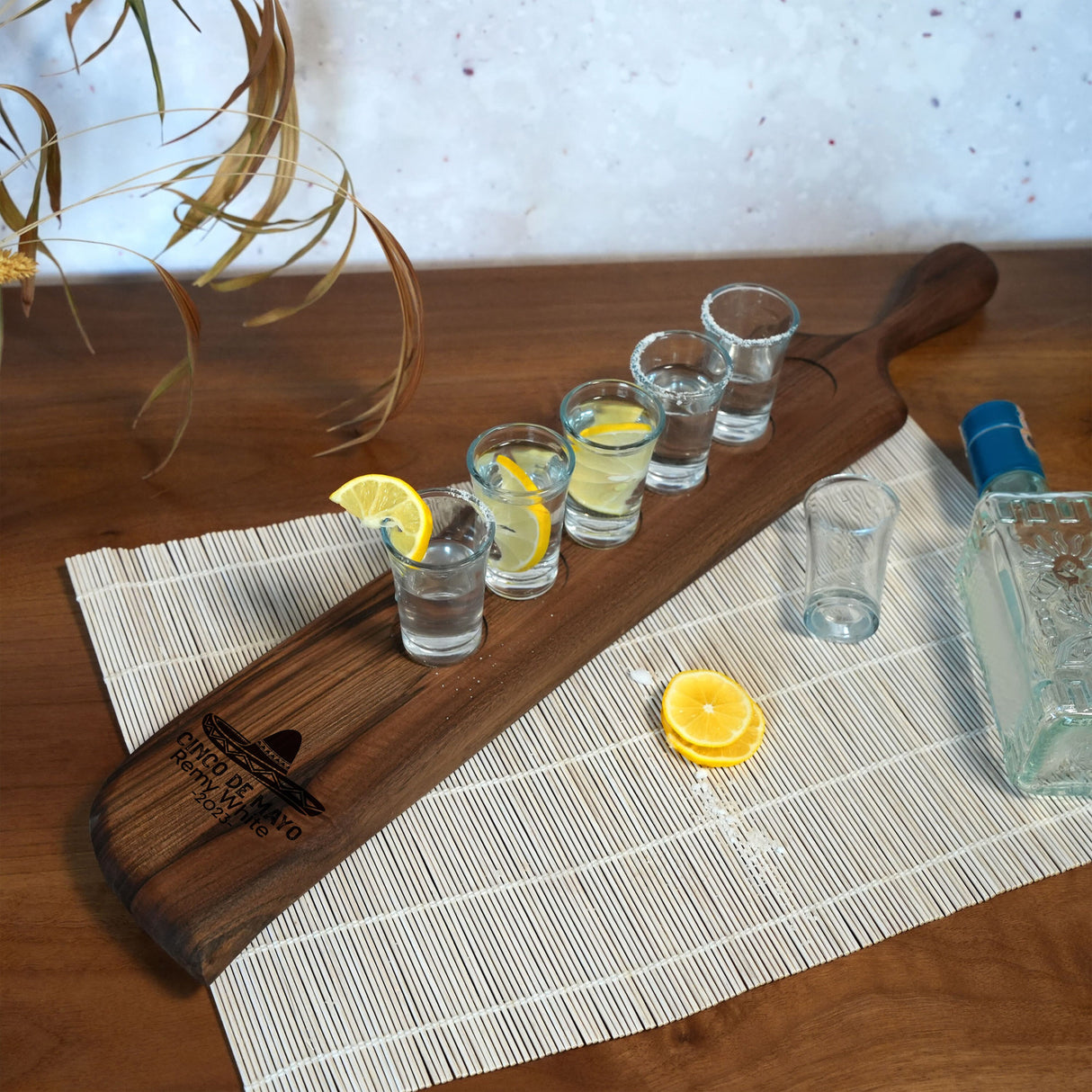 a wooden paddle sitting on top of a wooden table