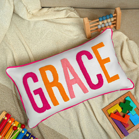 a pillow with the word grace on it