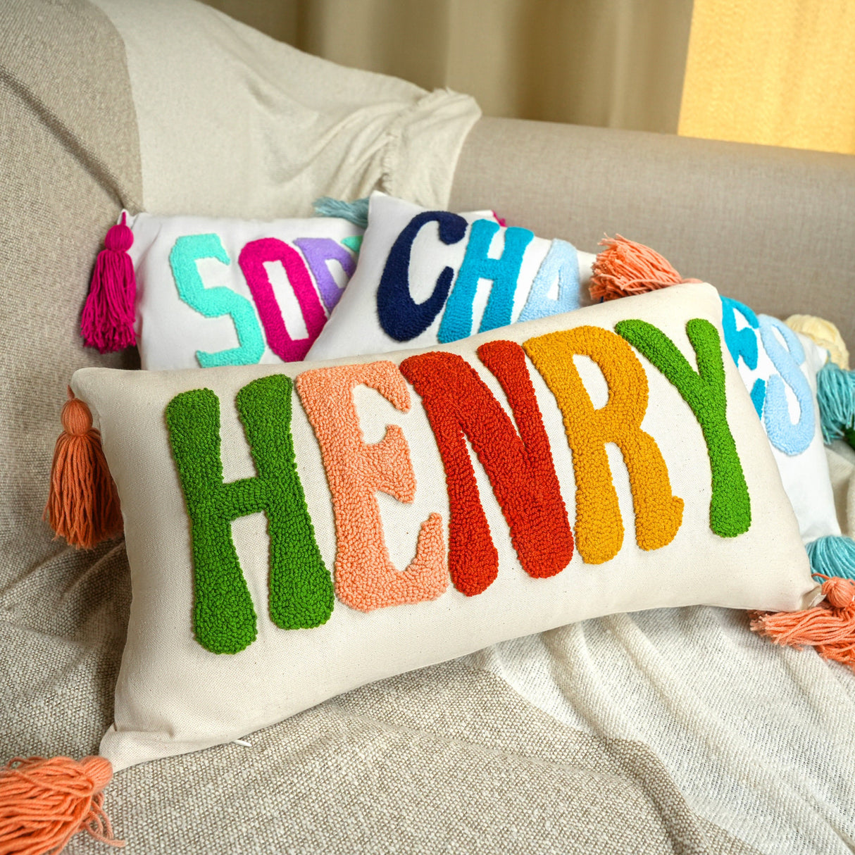 a pillow with the word henry on it