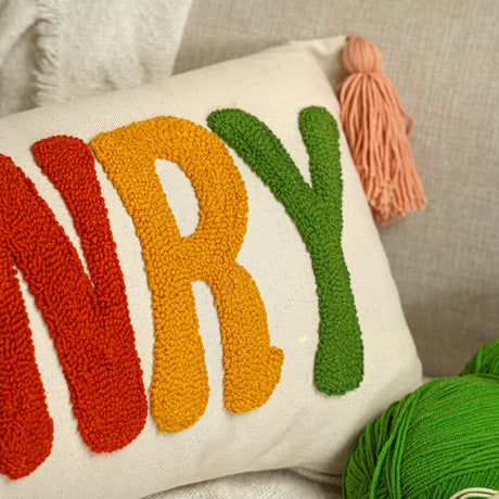 a close up of a pillow on a couch