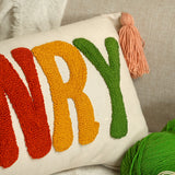 a close up of a pillow on a couch