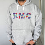 a man wearing a grey hoodie with the word smr printed on it