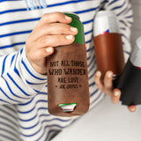 a woman is holding a can holder with a message on it