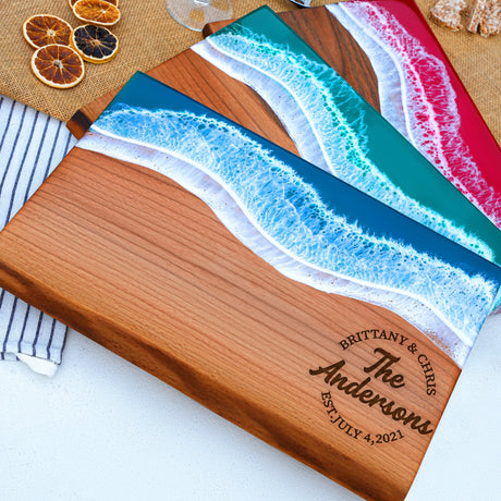 a wooden cutting board with a picture of a wave on it