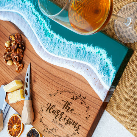 a cutting board topped with sliced oranges and nuts