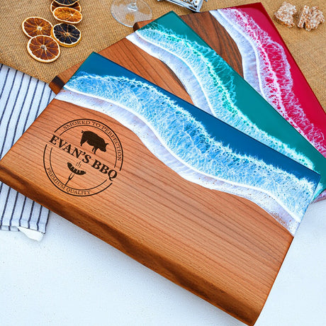 a wooden cutting board with five different cutting boards on top of it