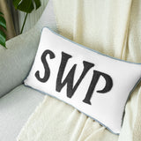 a pillow with the word swp on it