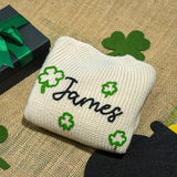 a st patrick&#39;s day sweater with shamrocks on it